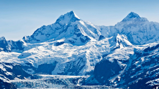 Glacier and snow capped mountains in the Glacier Bay National Park Alaska